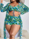 Women's floral print polyester bikini three-piece set with bra, shorts, and cardigan.