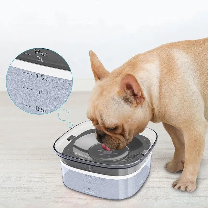 Transparent 70oz anti-spill slow drinking dog water bowl with floating disk on non-slip base