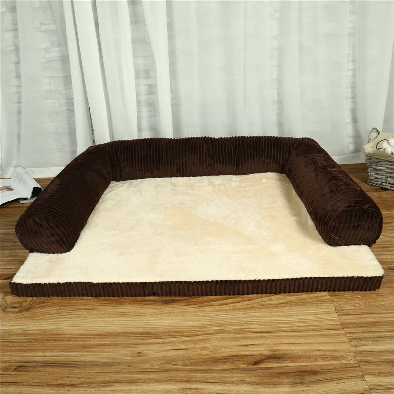 Corduroy pet dog sofa with bolster sides on a non-slip cloth base, shown in grey colour.