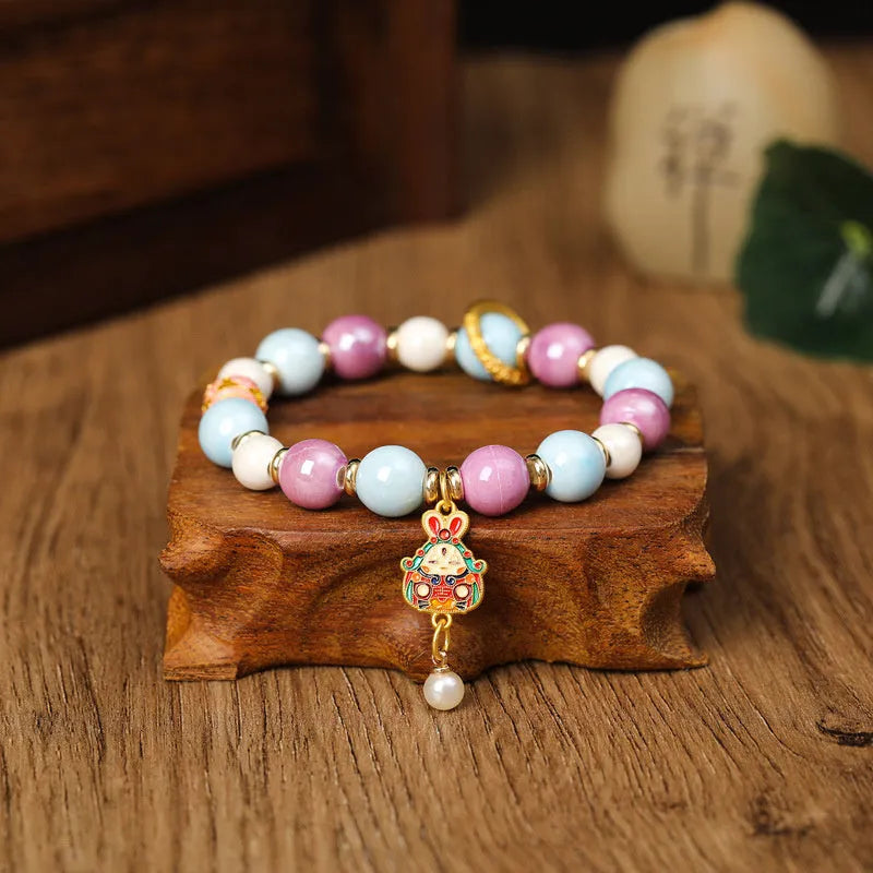 Grey porcelain glazed ceramic Lucky Rabbit charm bracelet on adjustable string