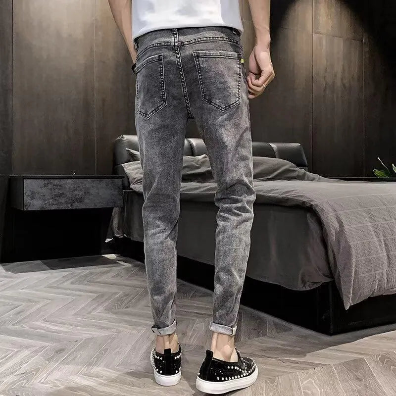 Men's high waist denim jeans trousers with button fly in cotton fabric