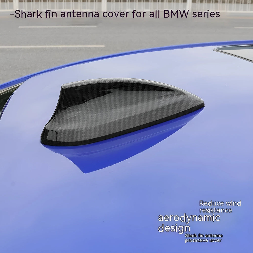 BMW shark fin antenna cover in carbon drill pattern and piano black finishes for Type A, B, and E models.