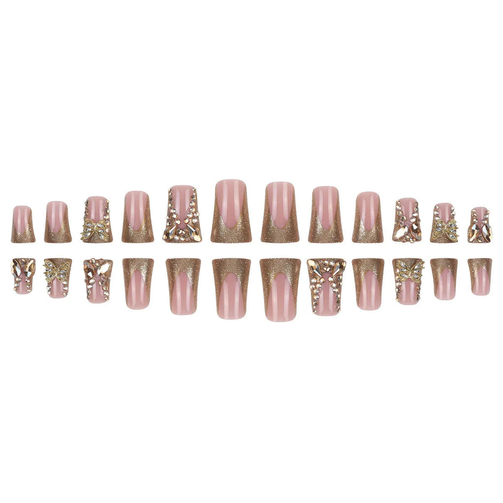 24 golden diamond and butterfly debris nail stickers in colour D34 with a tube of glue.