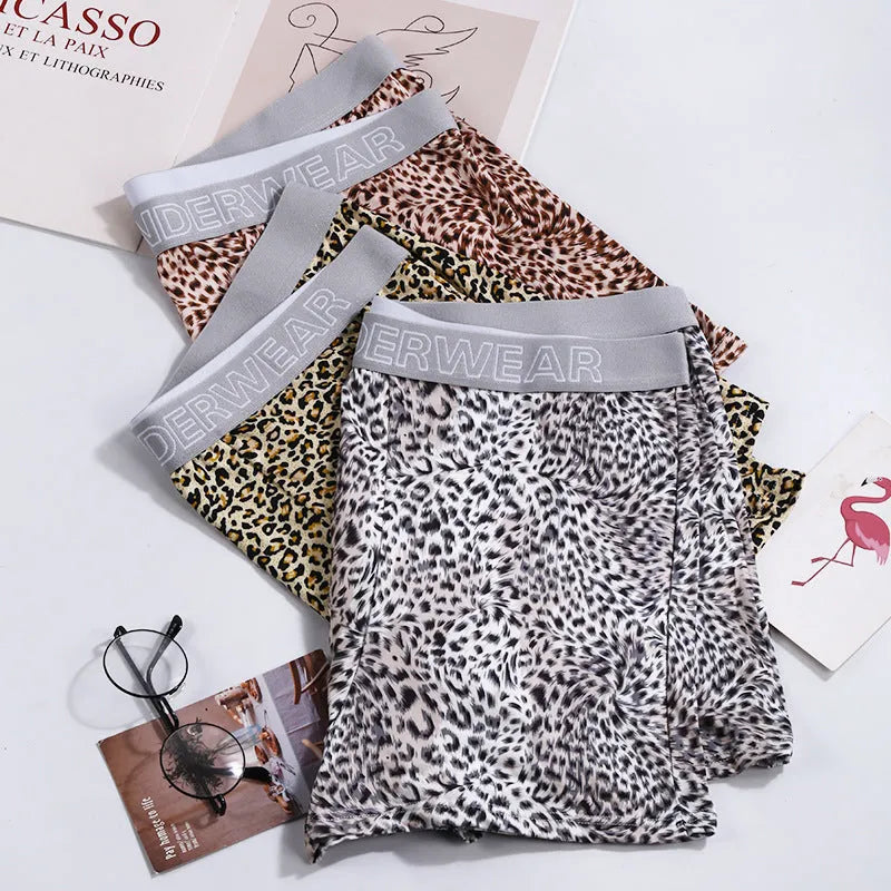 Men's loose fit leopard print underwear in grey and yellow colours on a white background