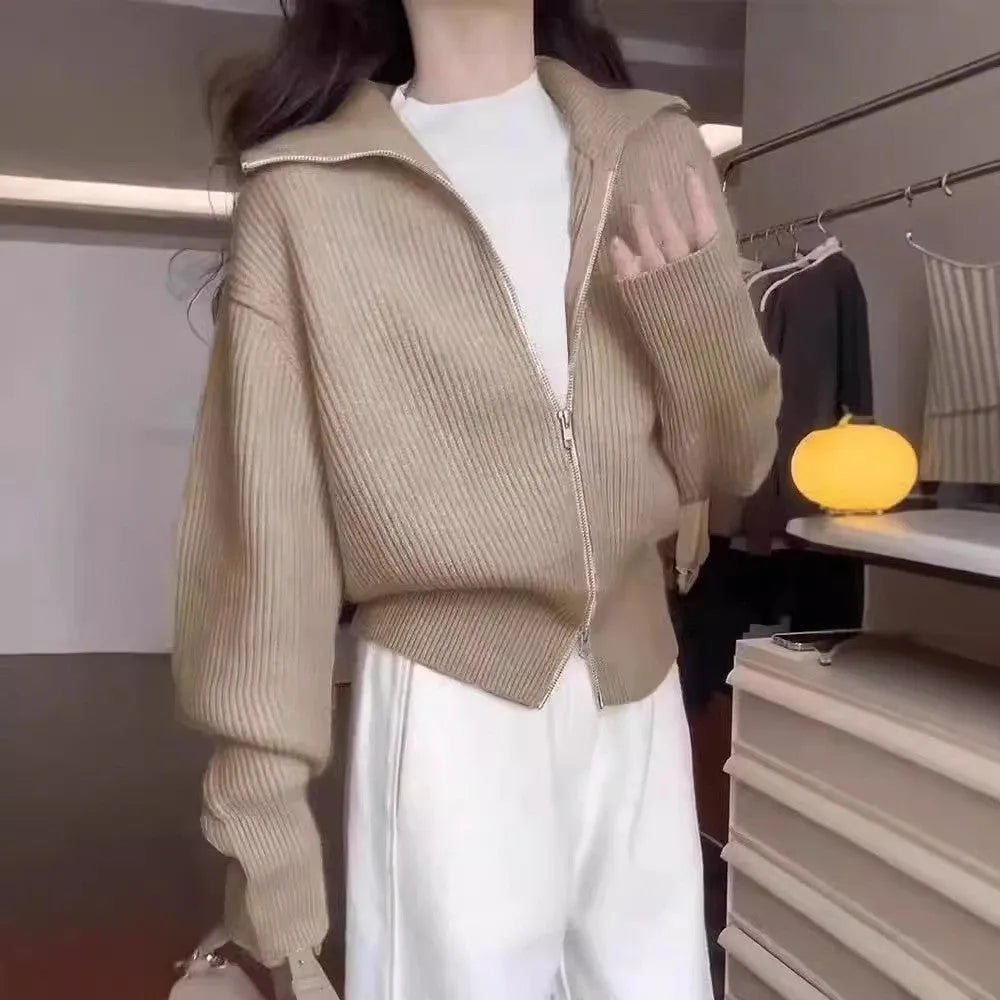 Hong Kong style grey double zipper knitted cardigan jacket with a floral pattern, shown on a model.