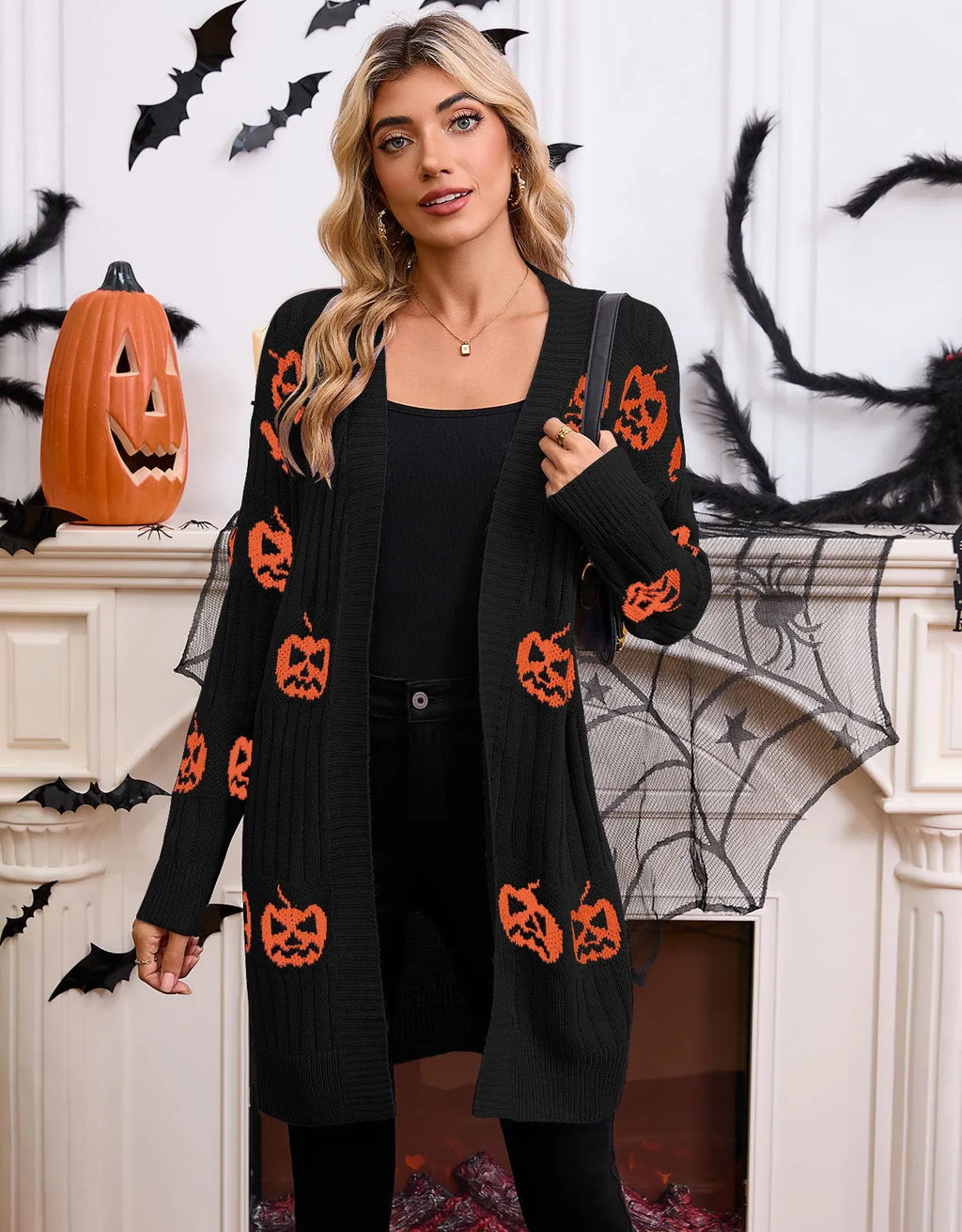 Women's black Halloween cardigan with orange pumpkin head Jacquard knit pattern.