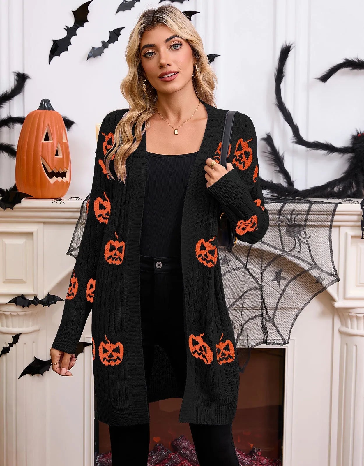 Women's black Halloween cardigan with orange pumpkin head Jacquard knit pattern.