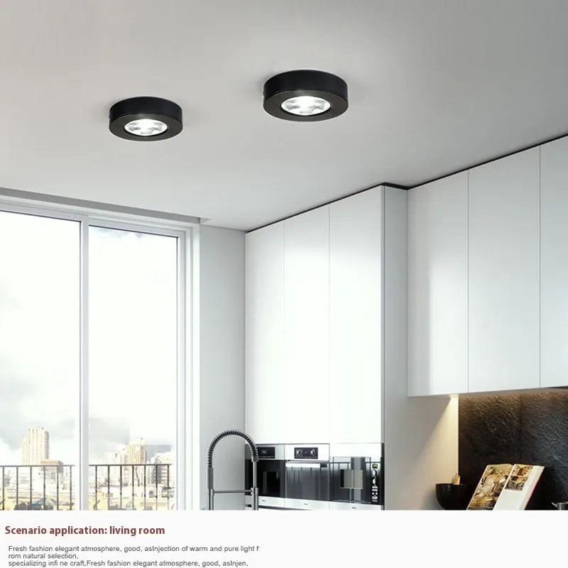Ultra-thin LED surface mounted downlight with aluminium alloy shell, available in black, gold or white, 75mm to 125mm