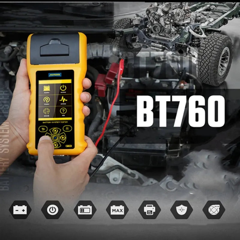 Autool BT760 vehicle battery tester with colour screen and attached battery clips on a workbench