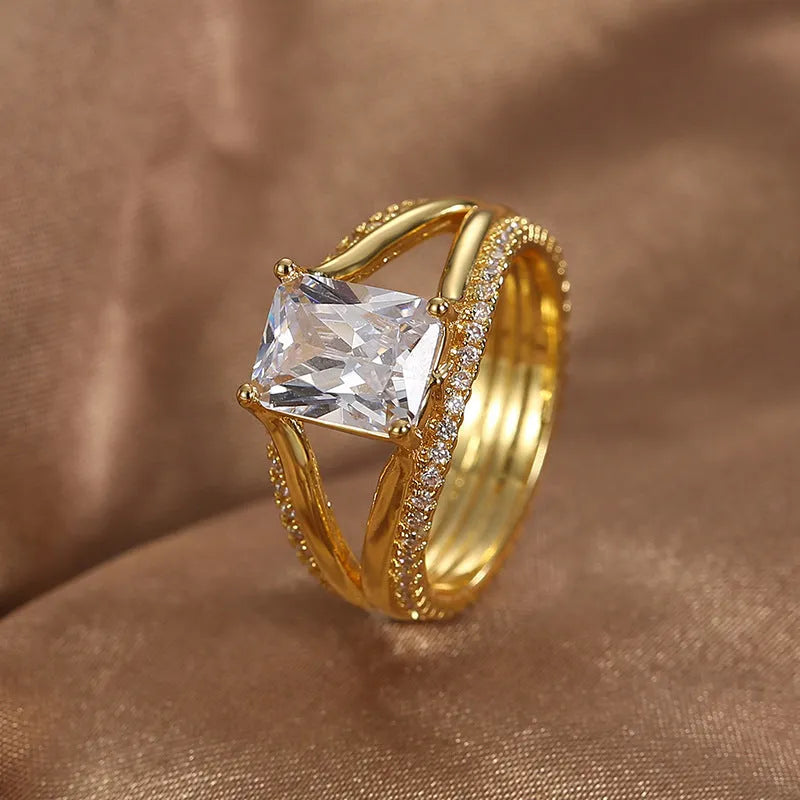 Gold geometric women's ring with square zircon stone on copper band