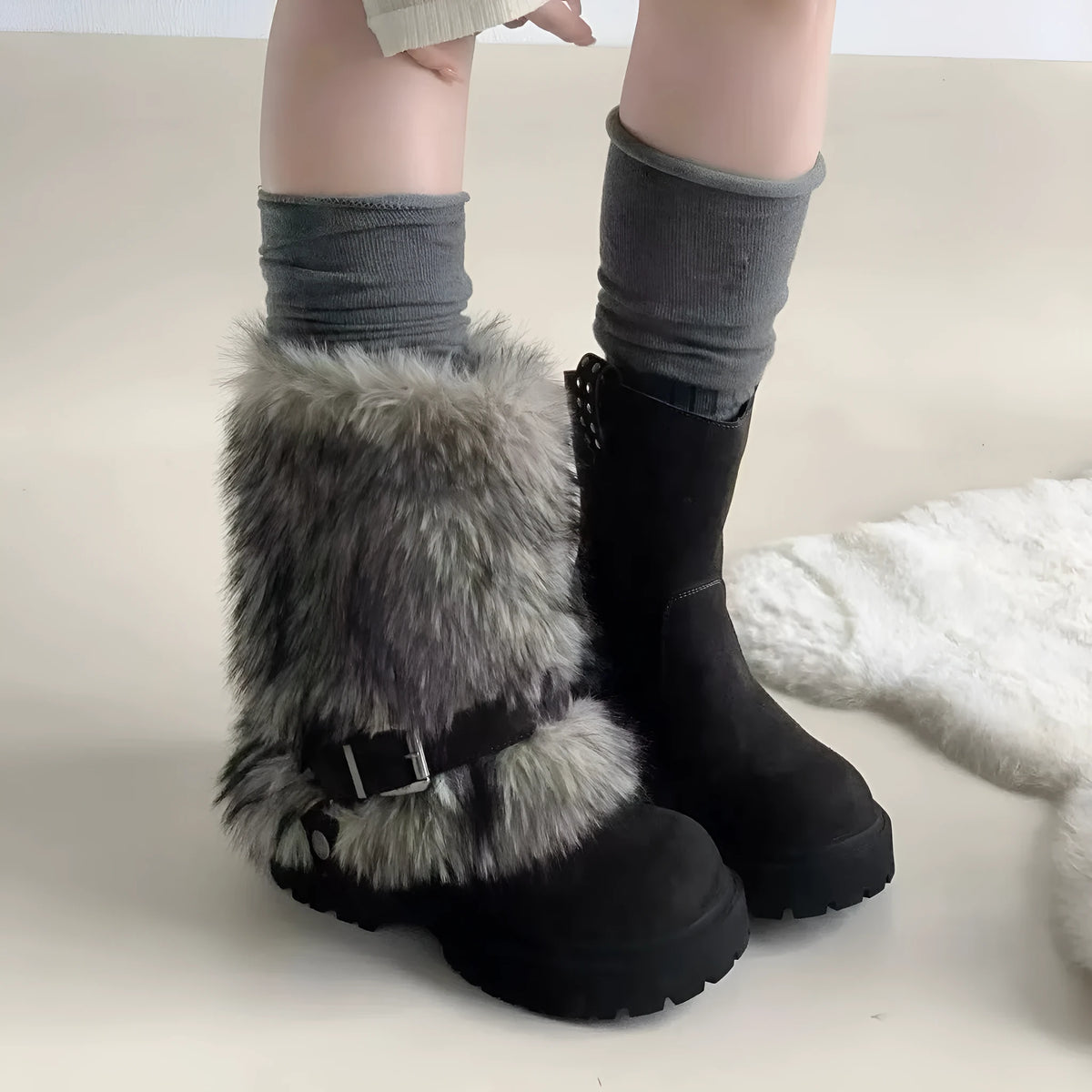 Women's winter snow boots in beige with artificial plush upper, thick rubber sole, and mid-calf shaft