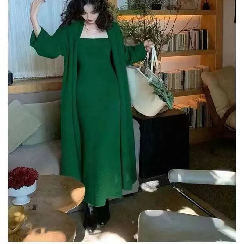 Women's grey knitted long sleeve cardigan and dress co-ord set with flocking detail on a hanger.