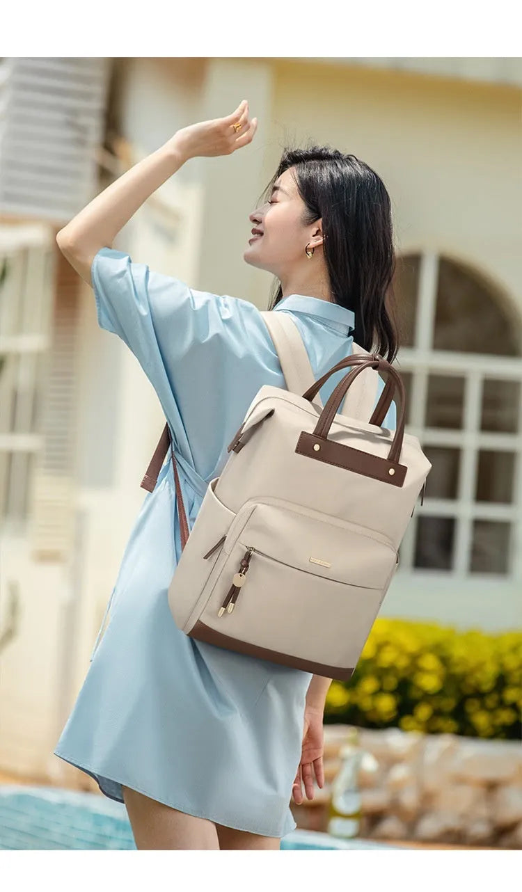 Large capacity women's backpack in synthetic leather fabric with adjustable straps
