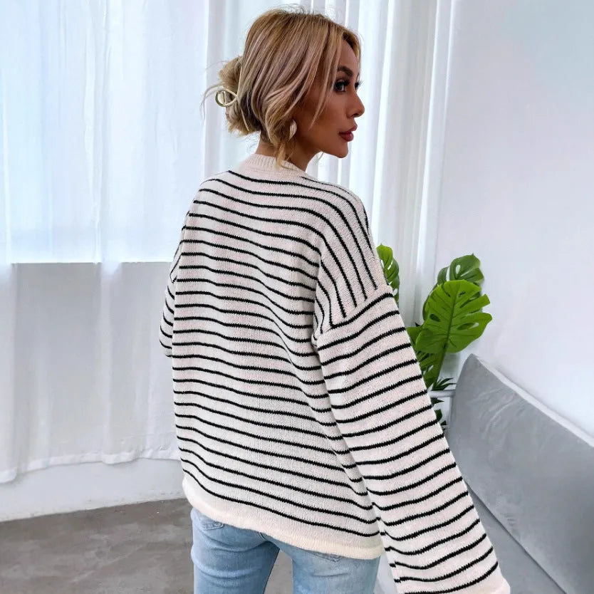 Black striped women's casual top with drop-shoulder sleeves made from viscose fibre knitted fabric