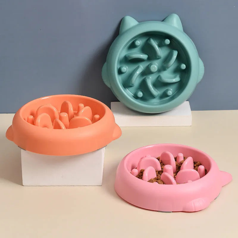 Pet slow feeder bowl in green with fun-shaped obstacles to slow eating and prevent gulping