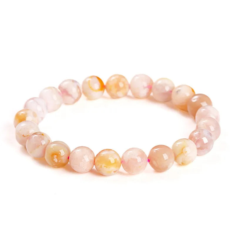 Natural cherry agate bracelet with round beads in a sweet style for women.
