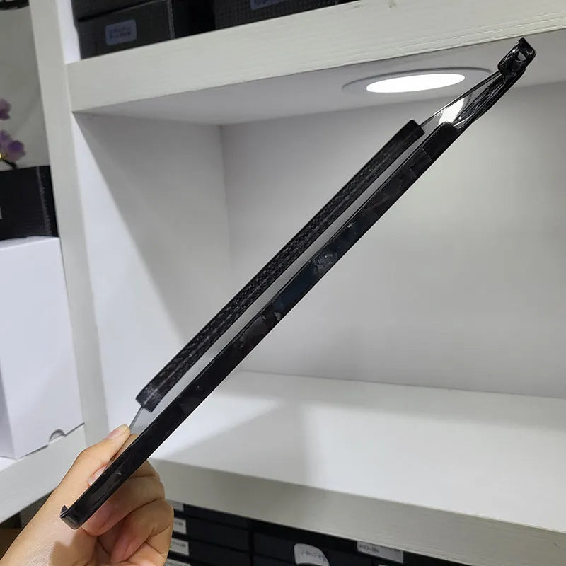 Real carbon fibre hard protective case for Apple iPad Pro 11 inch with embossed plaid design.