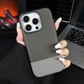 Black magnetic iPhone case with dragon scale texture and leather-style stitching, shown on an iPhone 15 Pro Max.