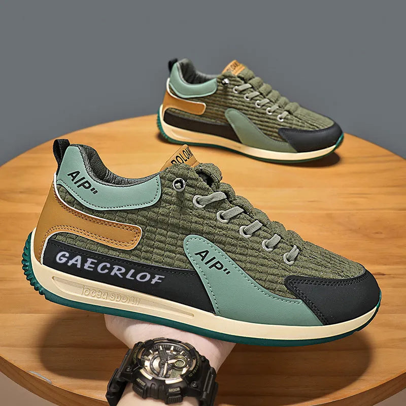 Men's green and grey mesh running shoes with low-top design and lace-up closure