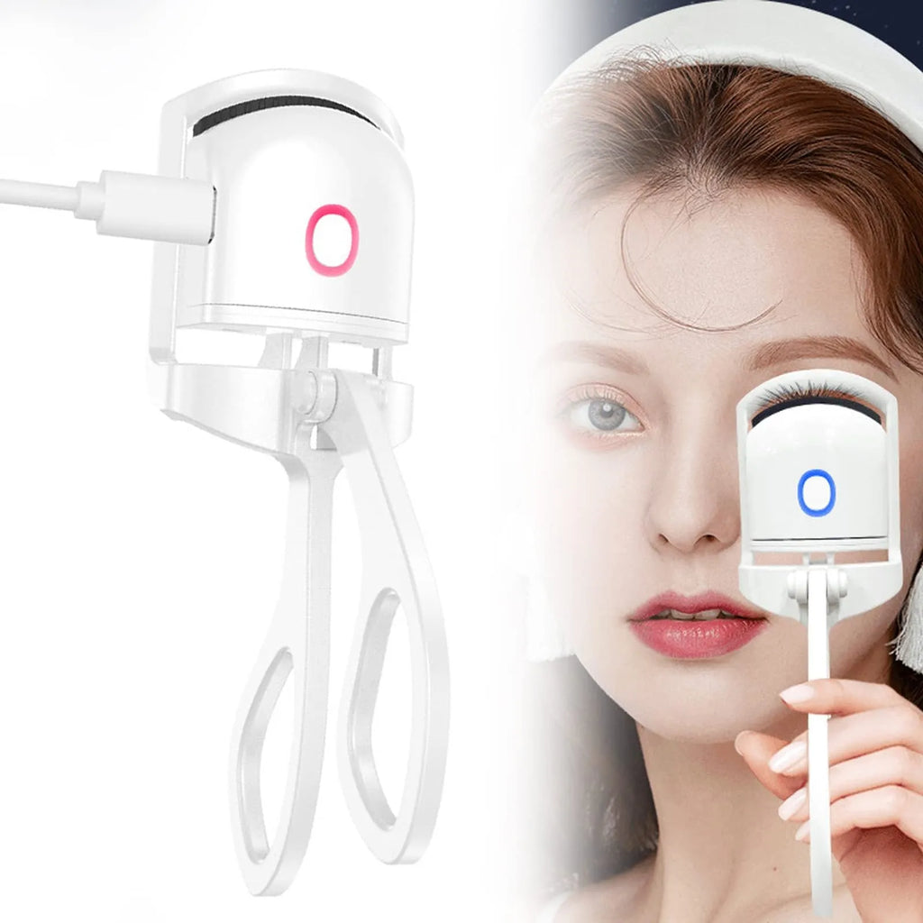 White USB rechargeable heated eyelash curler with a curved design and a small LED light.
