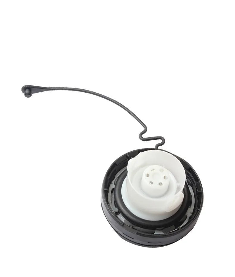 Toyota snap-in type fuel tank cap replacement auto part on white background