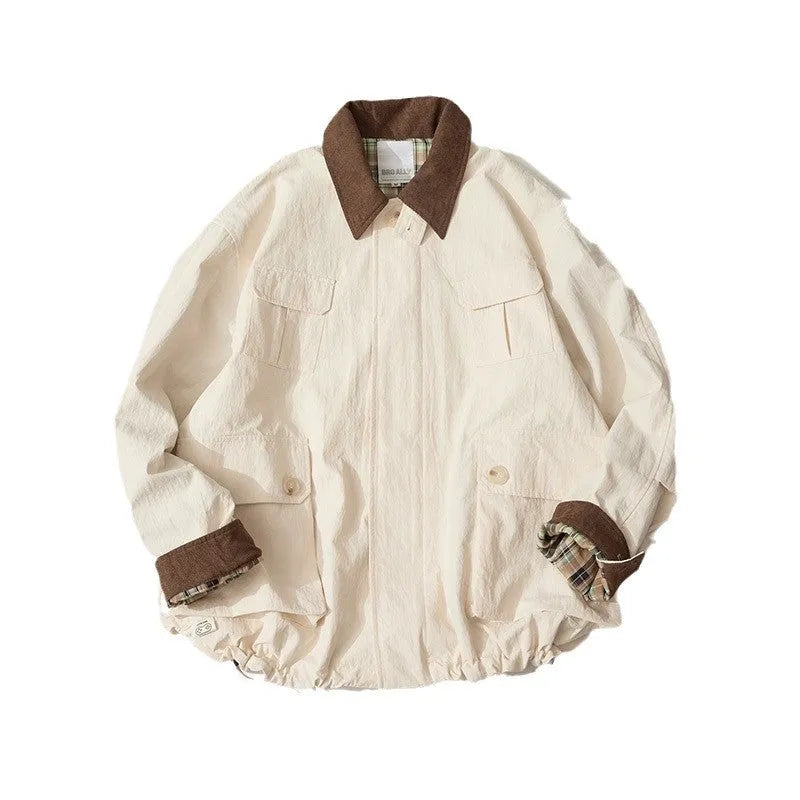 Green casual jacket with long sleeves and side seam pockets on a hanger