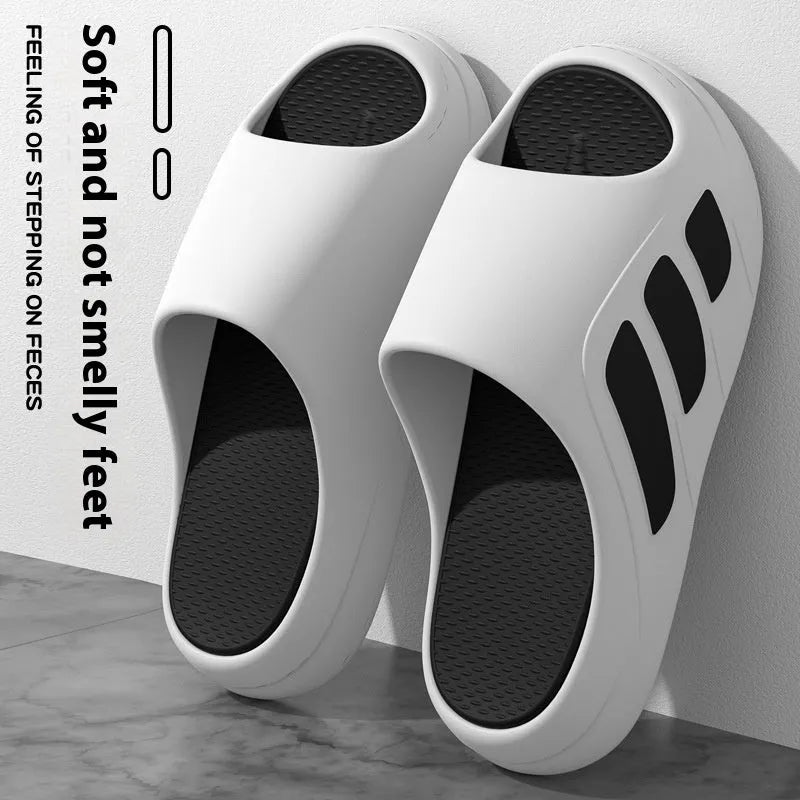 EVA platform slippers in brown, black, red and black, or white and black colours with letter design elements