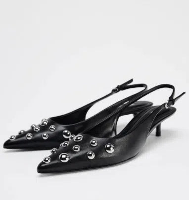 Women's black pointed stiletto wedge heel shoes with rivet decorations and synthetic PU upper