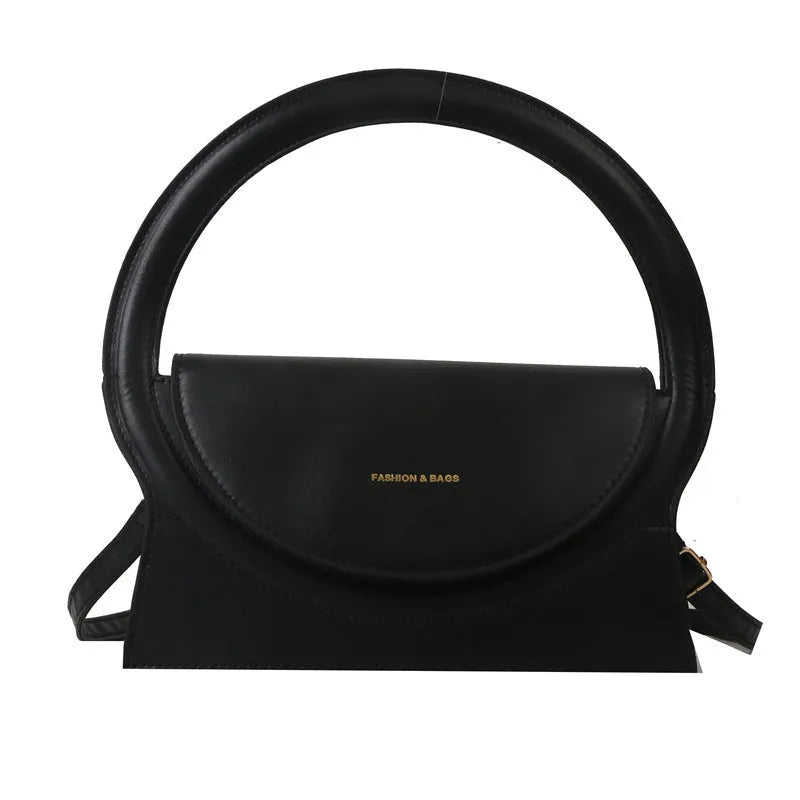 Horizontal square PU messenger bag showing sandwich pocket design and stitching details