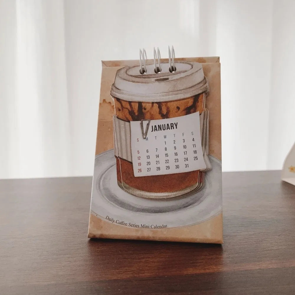 Mini desk calendar 2025 with four themed paper designs including coffee time model
