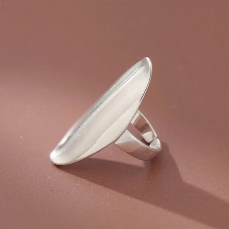 Geometric open ring for women in glossy electroplated silver tone on copper, adjustable band