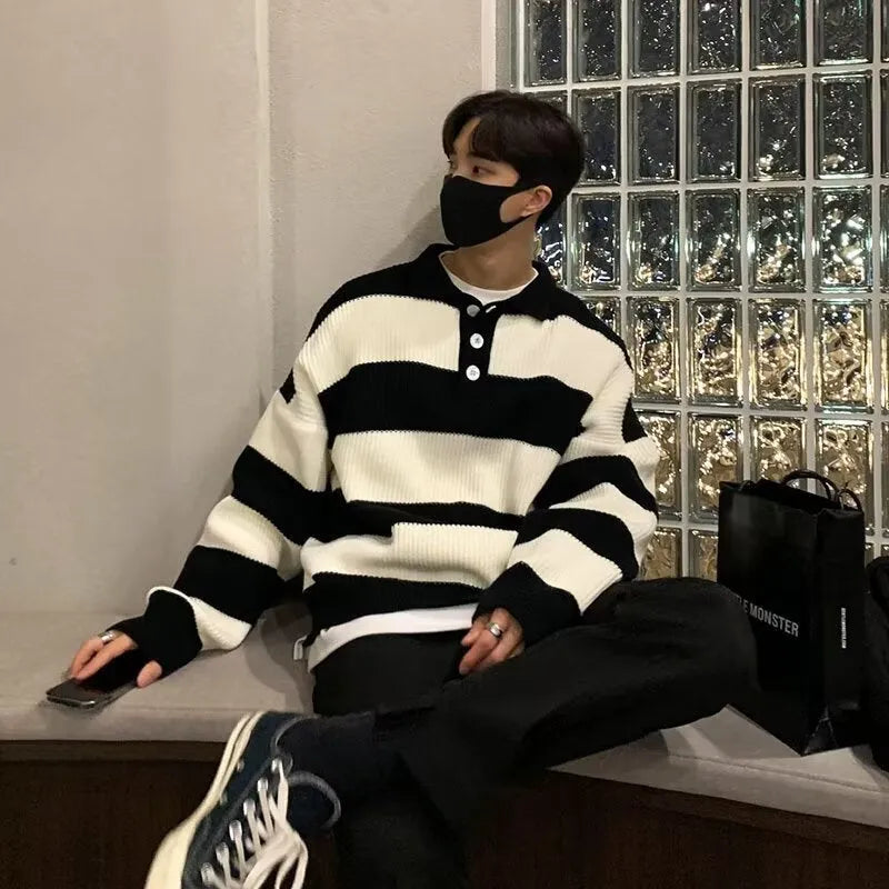 Men's loose fit black and grey striped sweater coat with long sleeves and pullover design
