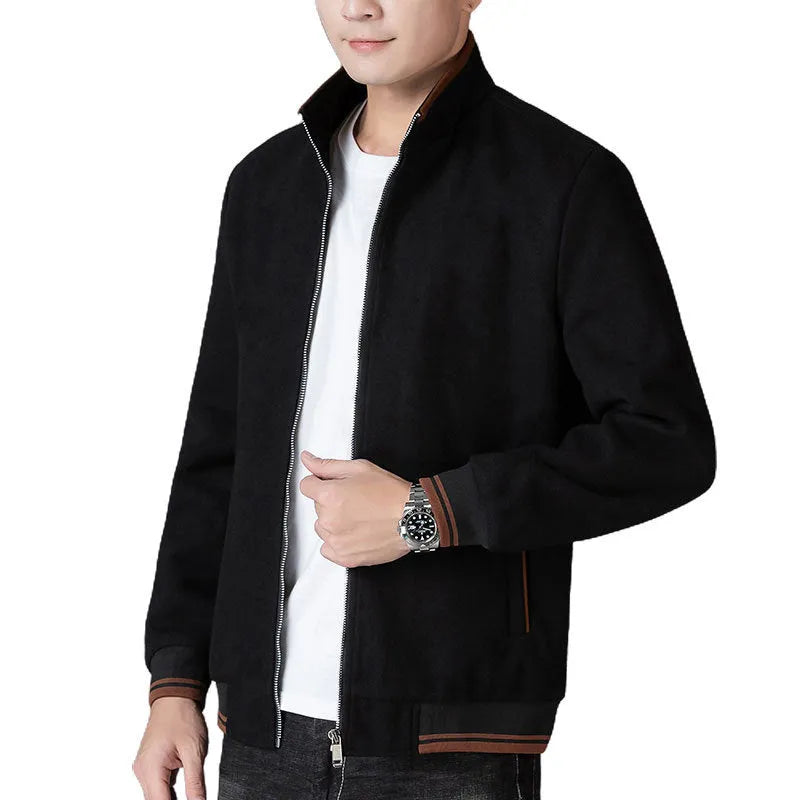 Men's grey polyester fleece sports coat with long sleeves and side pockets.