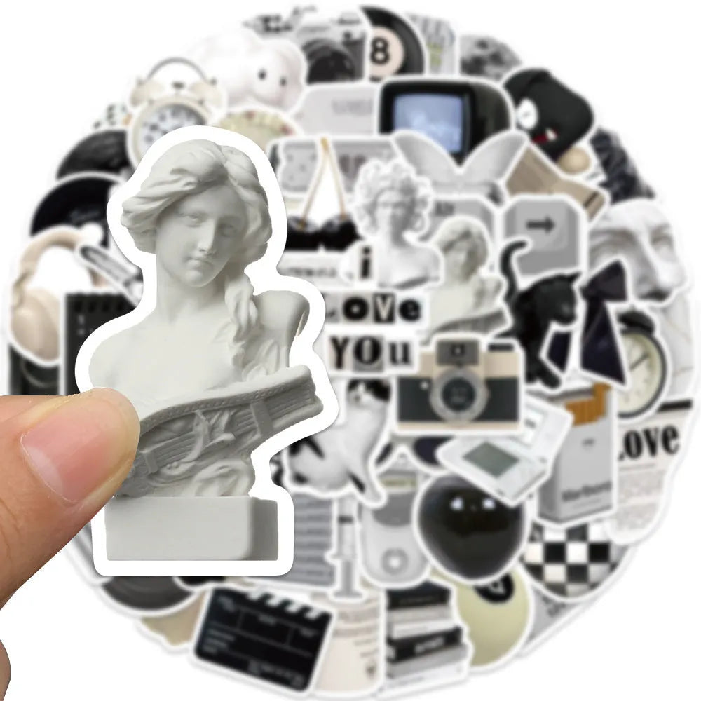 A pack of 61 black and white simple design waterproof PVC stickers for laptops and luggage.