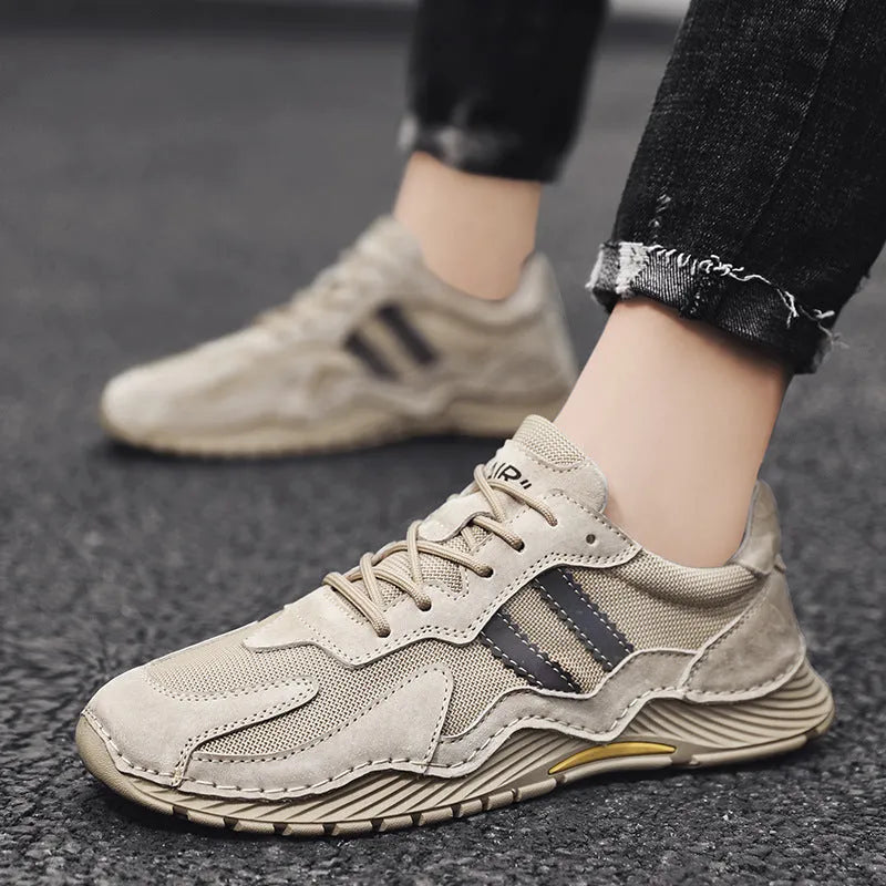 Men's low-top grey pigskin platform hiking boots with lace-up front and rubber sole.