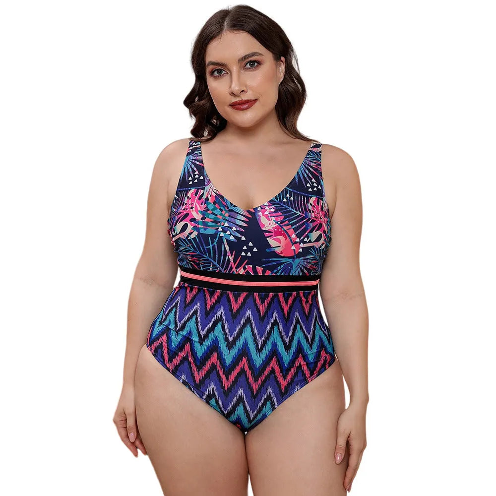 Women's blue striped one-piece swimsuit with spaghetti straps on a mannequin.