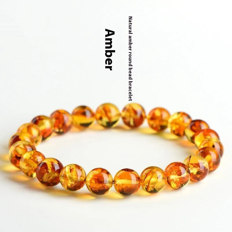 Natural yellow piebald amber bracelet with geometric polished beads.