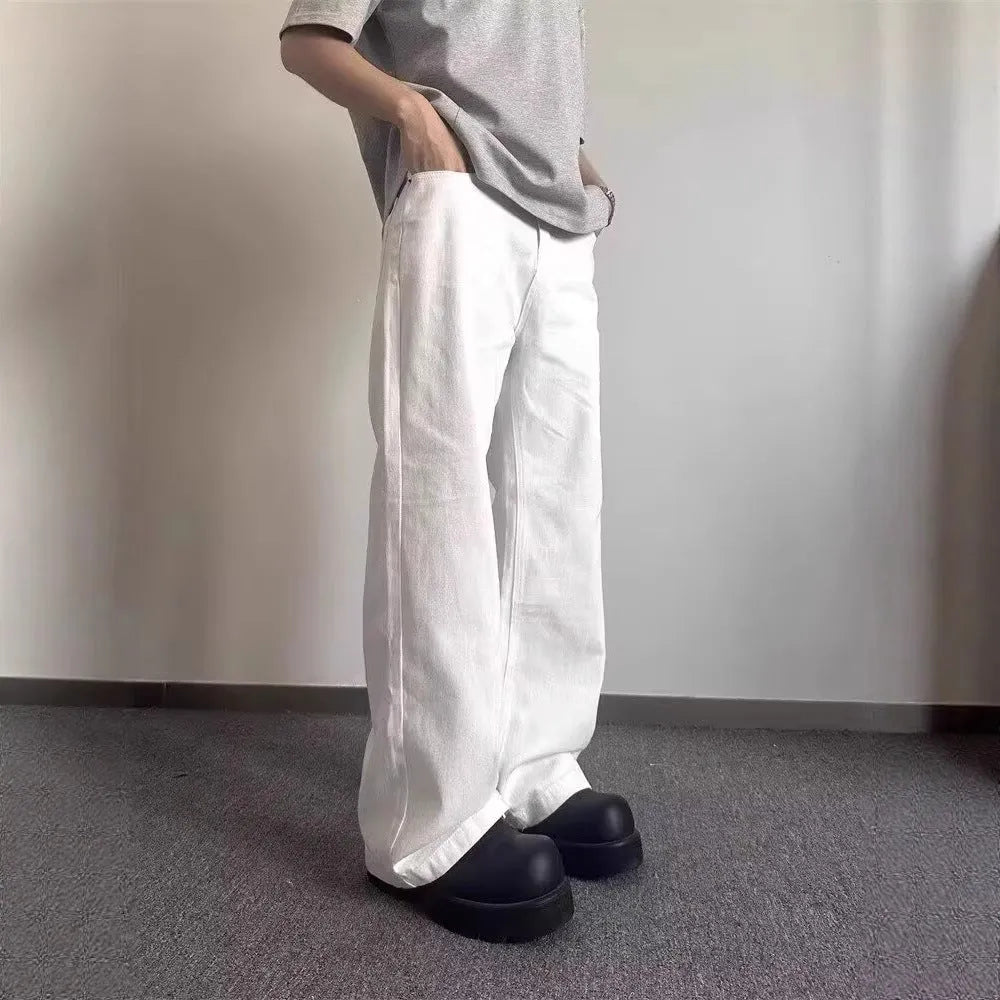 Men's straight wide-leg loose fit white denim jeans on a mid waist.