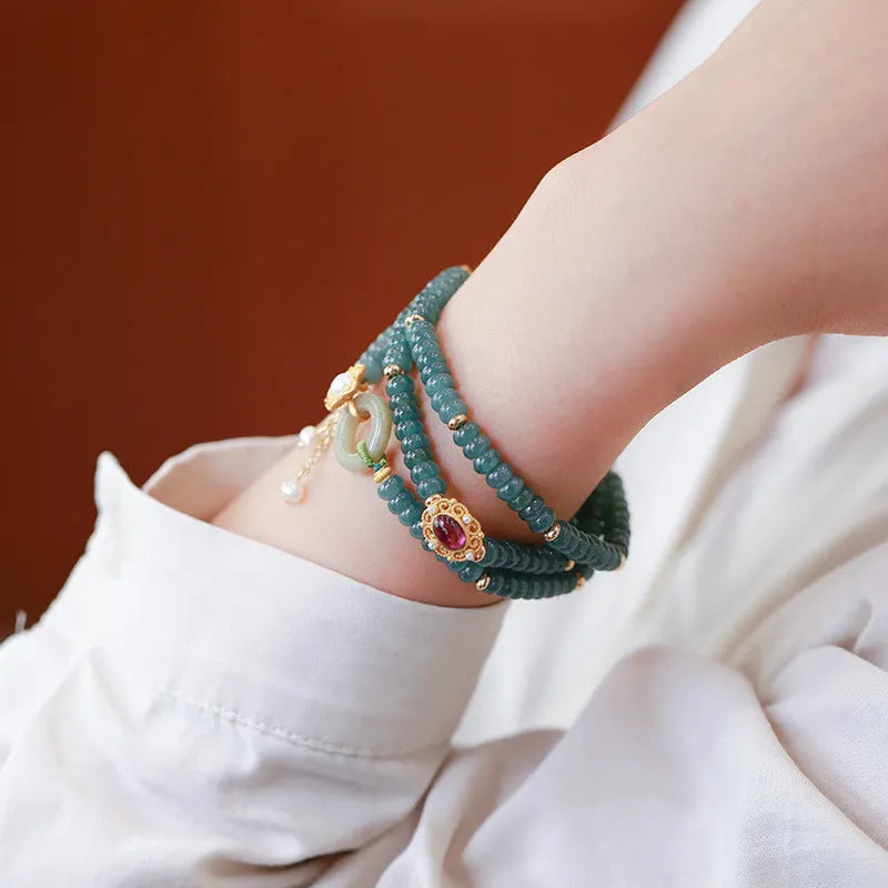 Blue water jade abacus bead bracelet with three rings of tourmaline and freshwater pearls, bead diameter under 4mm