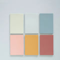 Pack of large 12cm x 8cm Post-it sticky notes in six different colours.