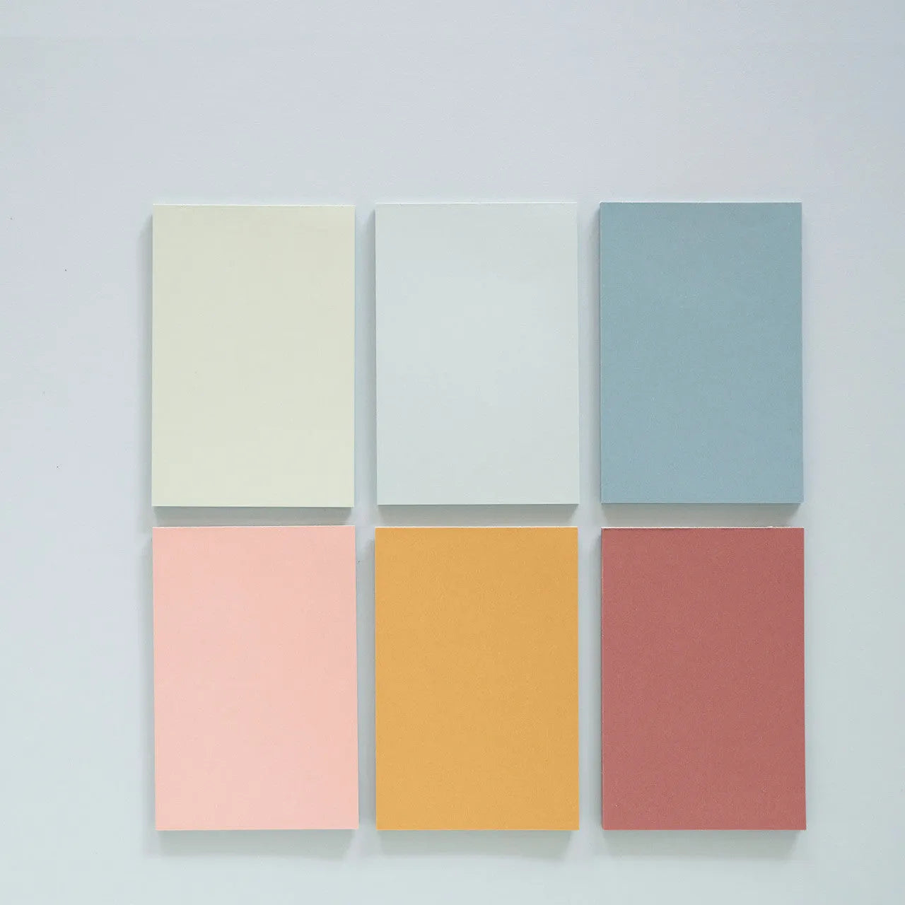 Pack of large 12cm x 8cm Post-it sticky notes in six different colours.