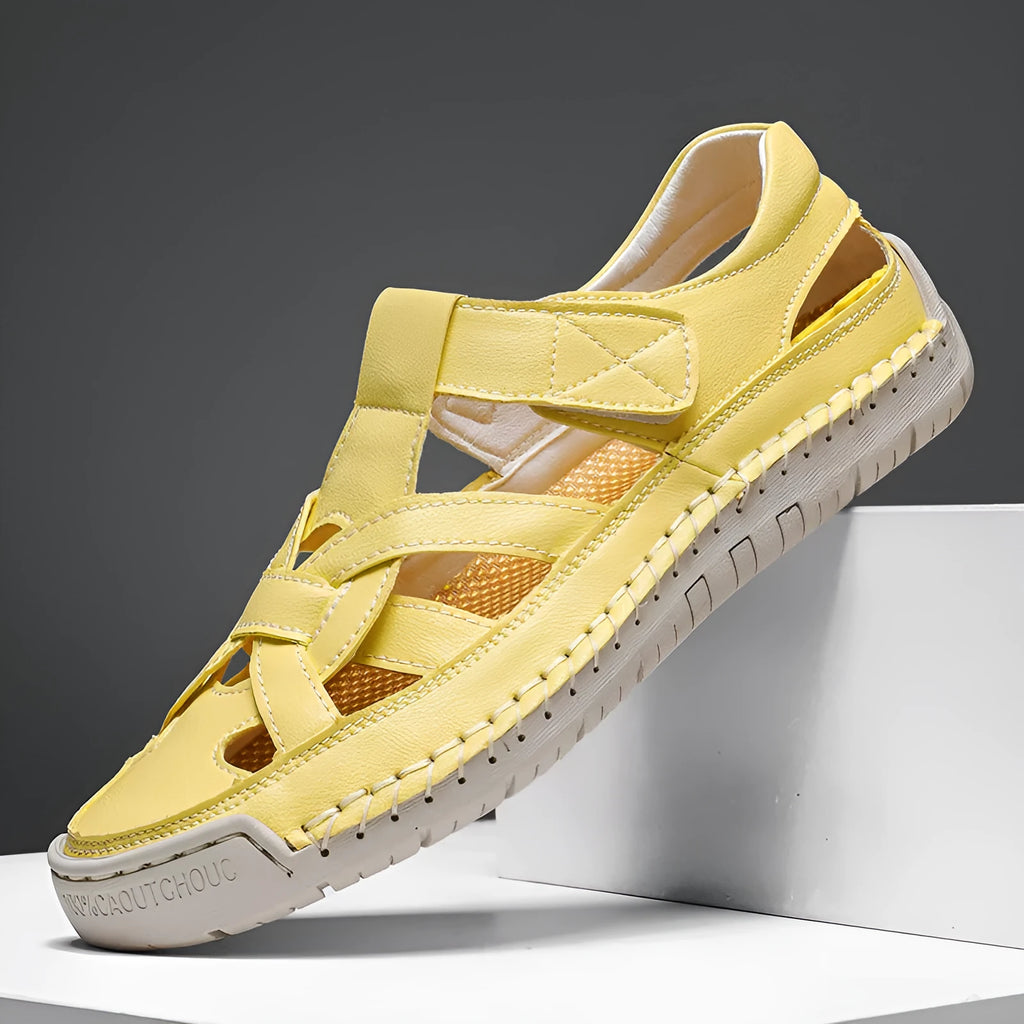 Women's low-top casual sandals with Velcro straps and a round toe in a solid colour.
