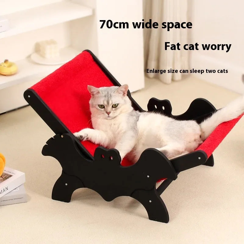 Black and red Halloween bat-themed wooden cat recliner bed with cage design and included lounge chair.