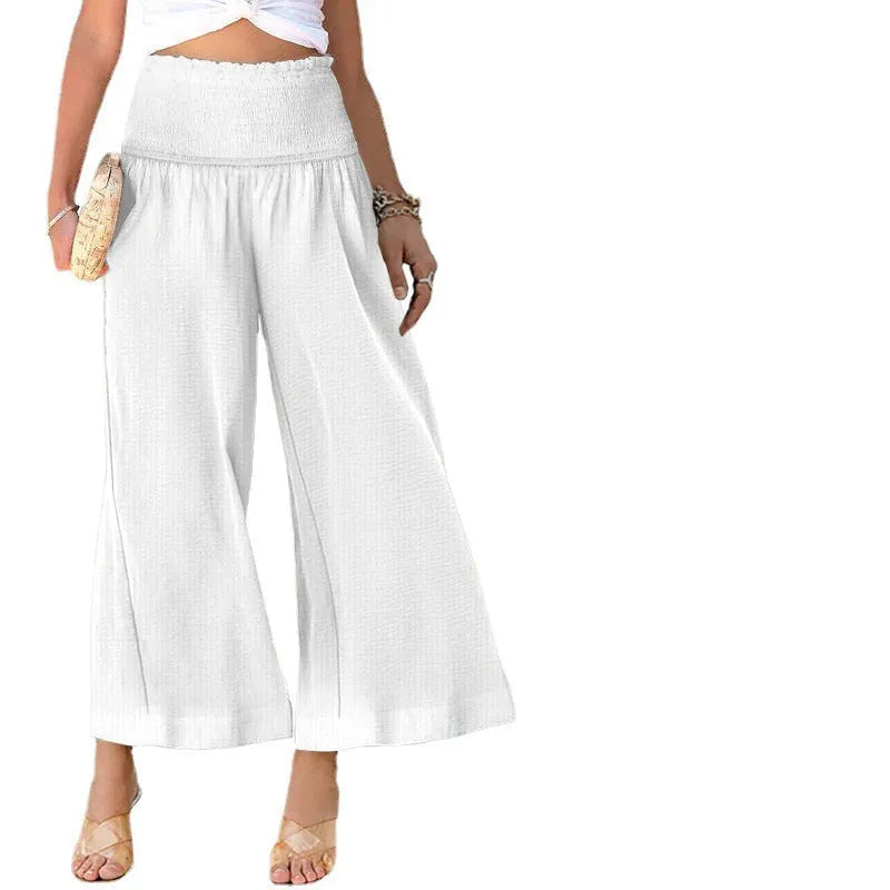Women's high-waist pleated cotton trousers in cropped straight-leg style