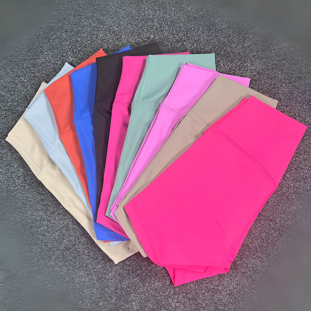 Women's high-waist yoga shorts in nylon fabric, shown in a colour selection including pink litchi and electric blue.