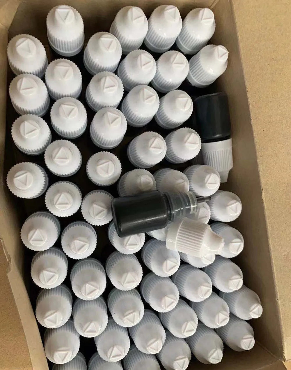A small bottle containing 5ml of black confidentiality seal ink for privacy stamps.