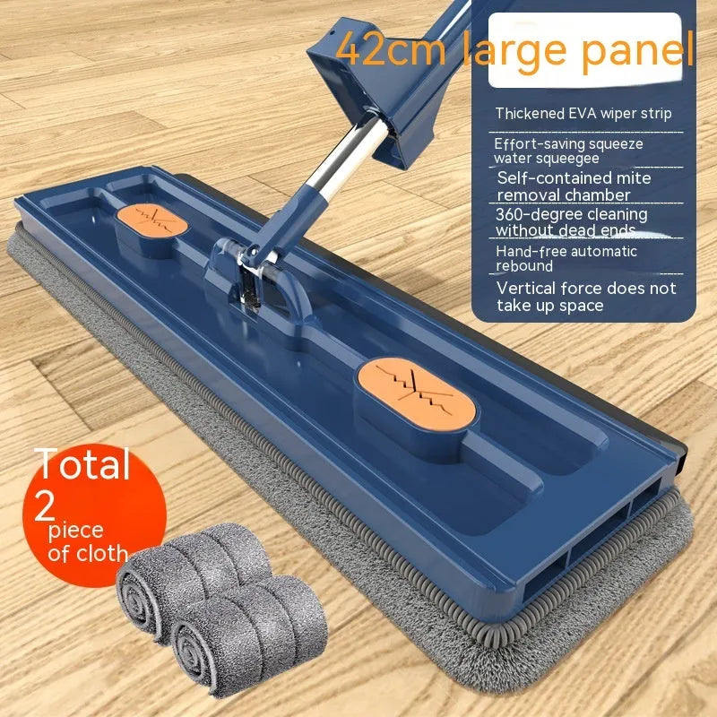 Large flat mop with blue cloths on stainless steel handle showing 360 degree rotating head mechanism