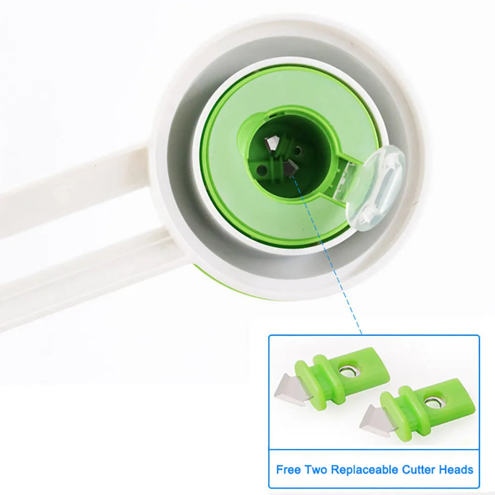 Green plastic round rotary paper cutter on a desk next to an A3 sheet of paper.