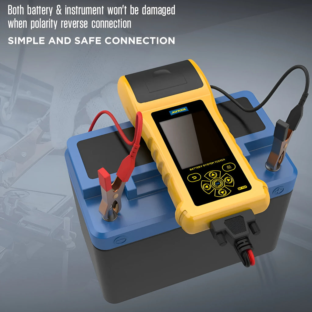 Autool BT760 vehicle battery tester with colour screen and attached battery clips on a workbench