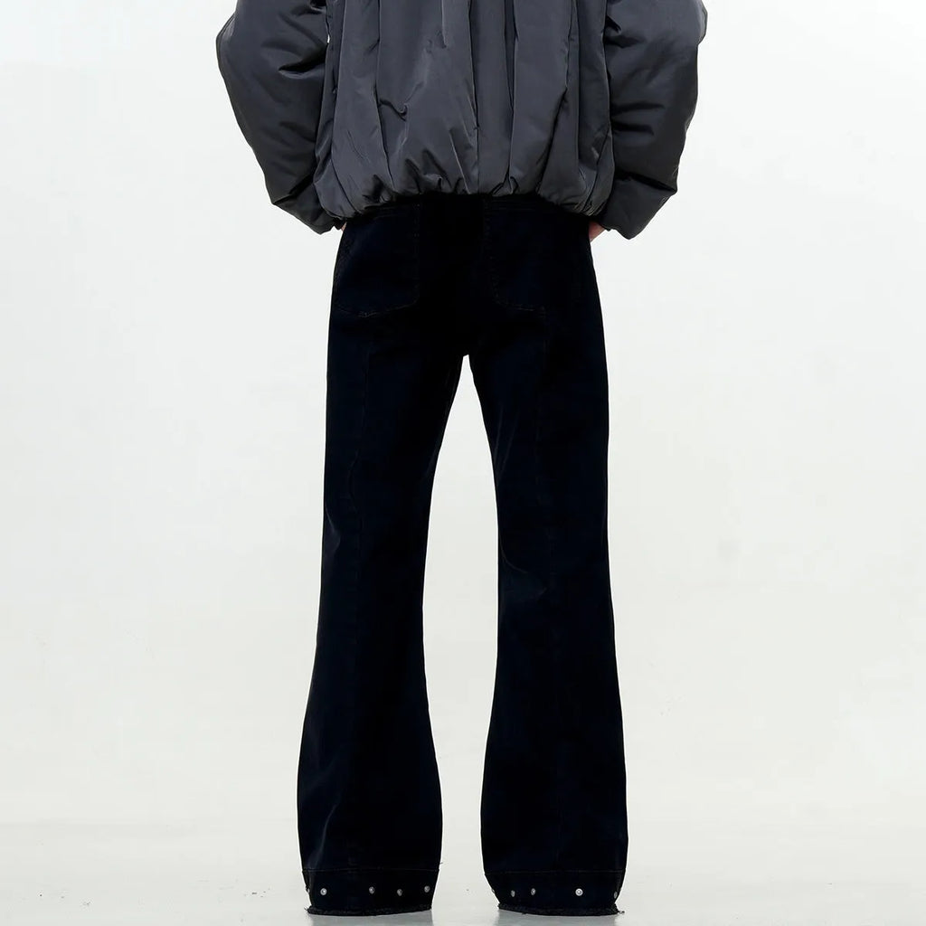 Black and grey green cotton retro skinny jeans with a straight leg and horn opening on a mid waist.